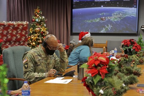 US officials: COVID, bomb cyclone won’t slow Santa’s travels