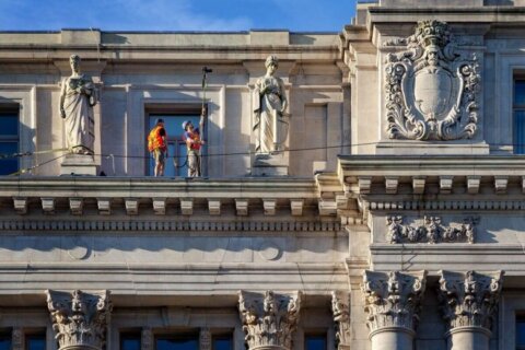 Photo installation reveals the sculptures high atop DC’s Wilson Building