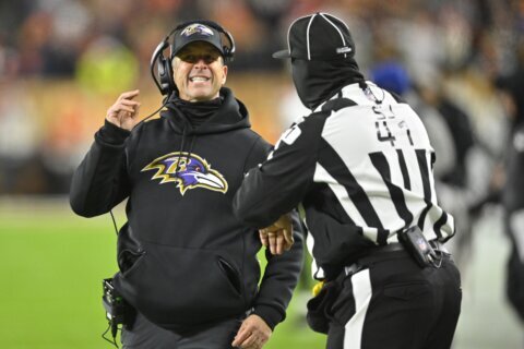 Safely in playoffs, Ravens still have division to play for