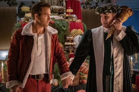 Review: Will Ferrell, Ryan Reynolds turn Scrooge into hilarious musical 'Spirited'