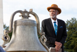 Dr. Bruce Purnell rings the 1863 bell on the steps of the Lincoln Memorial during the 2023 National Bell Festival. 