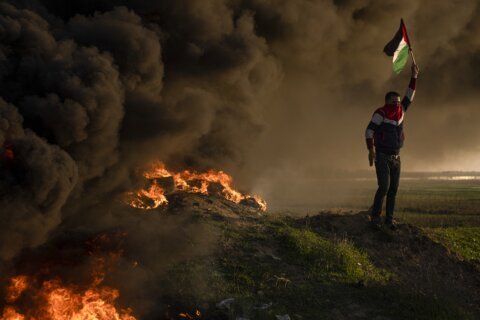 Israelis, Palestinians on edge even as risk of flare-up ebbs