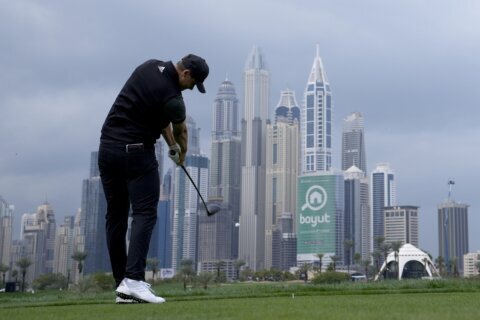 McIlroy and Reed both 6-under after 1st round in Dubai