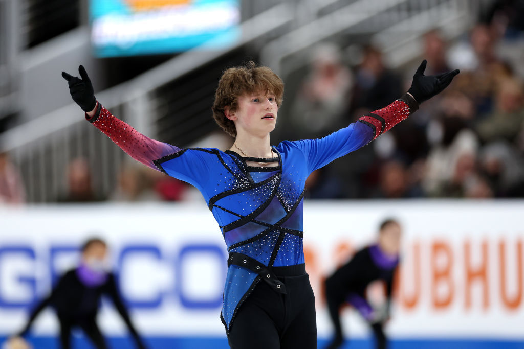 SAN JOSE, CALIFORNIA - JANUARY 29: Ilia Malinin waves to the crowd following the Men's Free Skate competition on day four of the 2023 TOYOTA U.S. Figure Skating Championships  at SAP Center on January 29, 2023 in San Jose, California. Malinin won the gold medal. (Photo by Ezra Shaw/Getty Images)