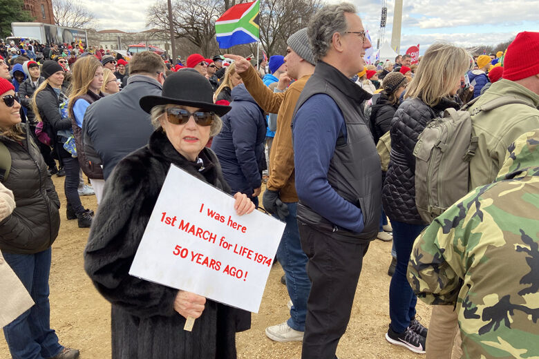 <p>An elderly abortion rights opponent at the March for Life on Friday, January 20, 2023, in Washington D.C., holding a sign that says she attended the first rally in 1974. (WTOP/Scott Gelman)</p>
