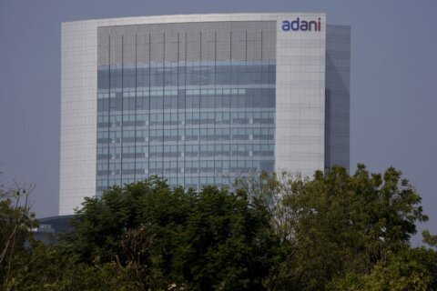 Adani $2.5B share sale pushes through amid fraud claims