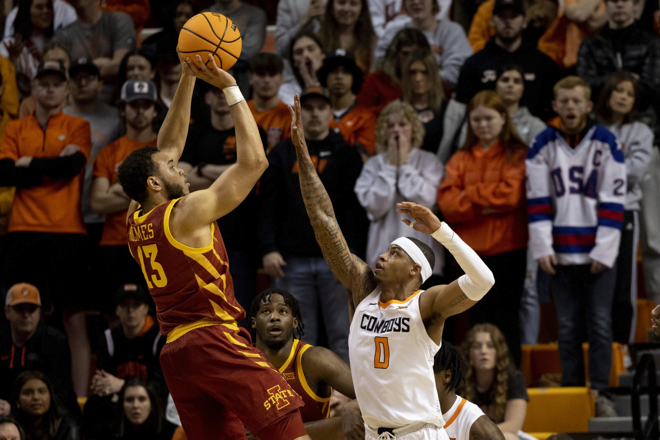 Anderson leads Oklahoma State past No. 12 Iowa State 61-59