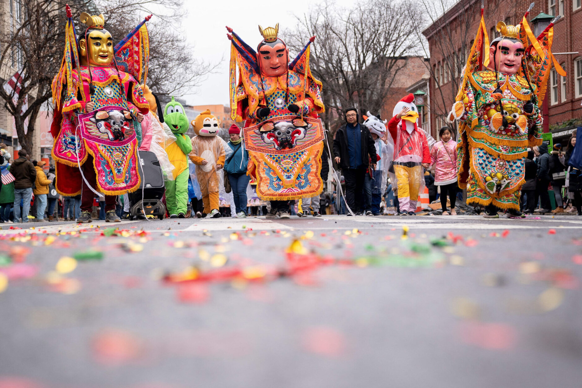 Participants march during the Lunar New Year Parade in the Chinatown neighborhood of Washington, DC, on January 22, 2023. - 2023 is the year of the rabbit in the Chinese horoscope. (Photo by Stefani Reynolds / AFP) (Photo by STEFANI REYNOLDS/AFP via Getty Images)