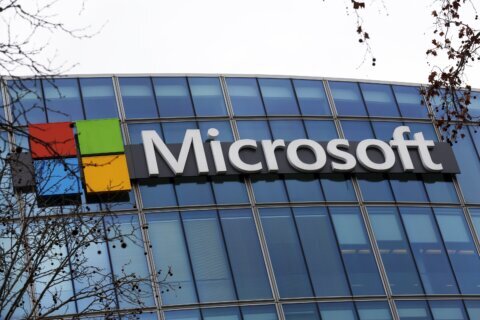 Microsoft, amid layoffs, says quarterly profit declined 12%