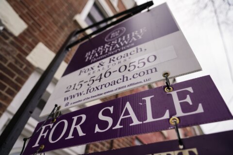 Average long-term US mortgage rate comes back down this week