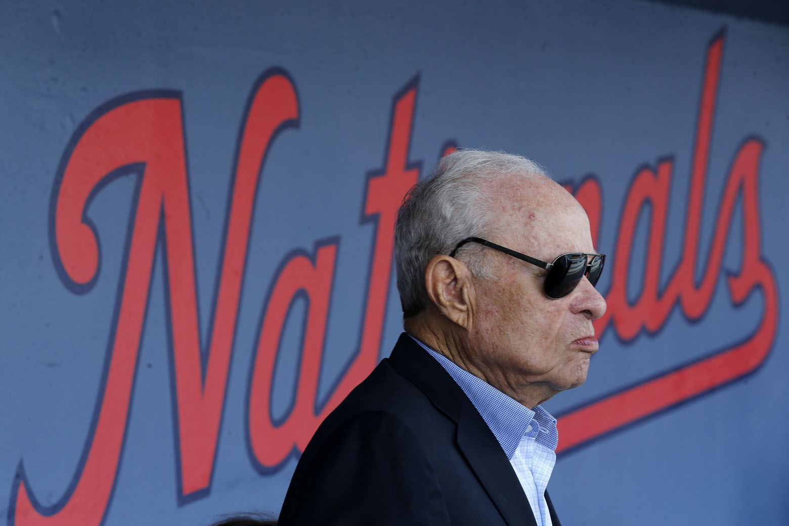 FILE - Washington Nationals owner Ted Lerner is shown in the dugout before a spring training baseball game against the Houston Astros, Feb. 28, 2017 in West Palm Beach, Fla. Washington Nationals founder Ted Lerner has died. He was 97. Lerner bought the team from Major League Baseball in 2006 for $450 million. He was managing principal owner until ceding that role to son Mark in 2018. (AP Photo/John Bazemore, file)