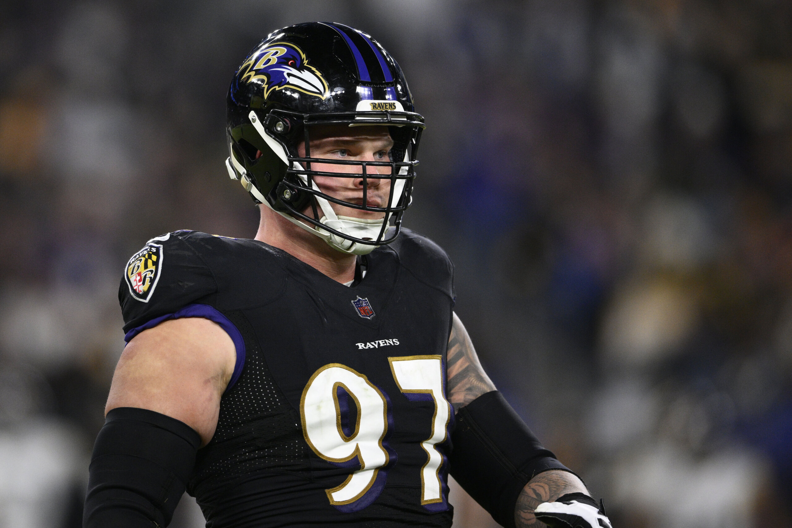 Baltimore Ravens defensive end Brent Urban (97) looks on during an