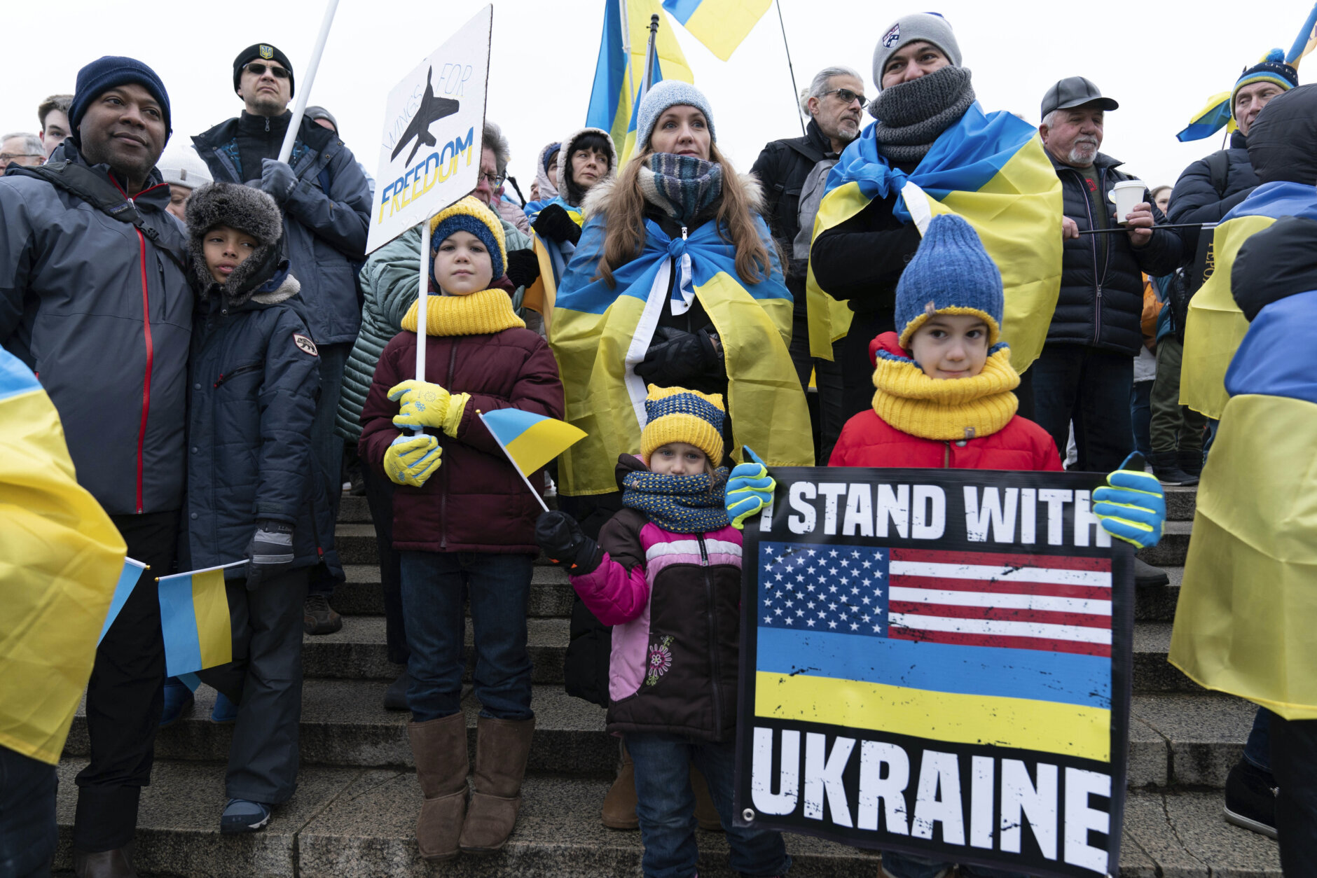 Demonstrators rally at Lincoln Memorial in support of Ukraine in Washington, Saturday, Feb. 25, 2023. (AP Photo/Jose Luis Magana)