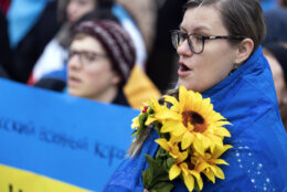 Demonstrators rally at the Lincoln Memorial in support of Ukraine, in Washington, Saturday, Feb. 25, 2023. (AP Photo/Jose Luis Magana)