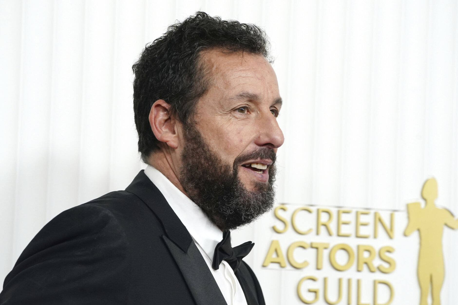 Adam Sandler arrives at the 29th annual Screen Actors Guild Awards on Sunday, Feb. 26, 2023, at the Fairmont Century Plaza in Los Angeles. (Photo by Jordan Strauss/Invision/AP)