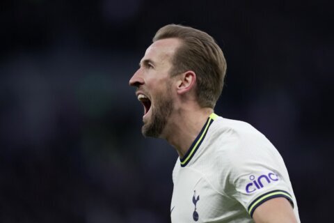 Kane’s milestone goal gives Tottenham win, helps Arsenal too