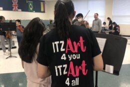Teen mentors in the program called "Itz Art 4 You Itz Art 4 All" could be found instructing small children in mixed-media art seated at large round tables, while others provided musical instrument training.