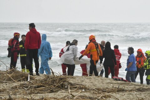 Migrant boat breaks up off Italian coast, killing nearly 60