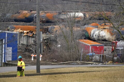 Wary residents return home after toxic train derailment