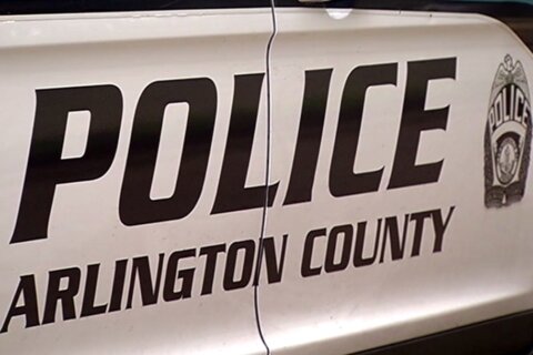 Man shot by police after barricade situation inside Arlington convenience store