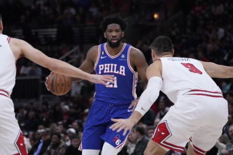 Sixers star Joel Embiid exits with mild right calf tightness
