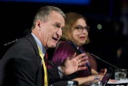 South Dakota Gov. Dennis Daugaard, talks about growing up with his father who was born deaf and cannot speak, during a special session of the National Governors Association 2013 Winter Meeting in Washington, Sunday, Feb. 24, 2013. Seated on the right, is invited panelist Judith Heumann, special advisor for International Disability Rights, State Department. Governors Sunday roundly condemned the automatic budget cuts set to take hold this week, and hoped for a deal to stave off the $85 billion reduction in government services. (AP Photo/Manuel Balce Ceneta)