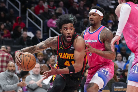 Hawks top Wizards 114-107 to sweep 2-game set at Washington