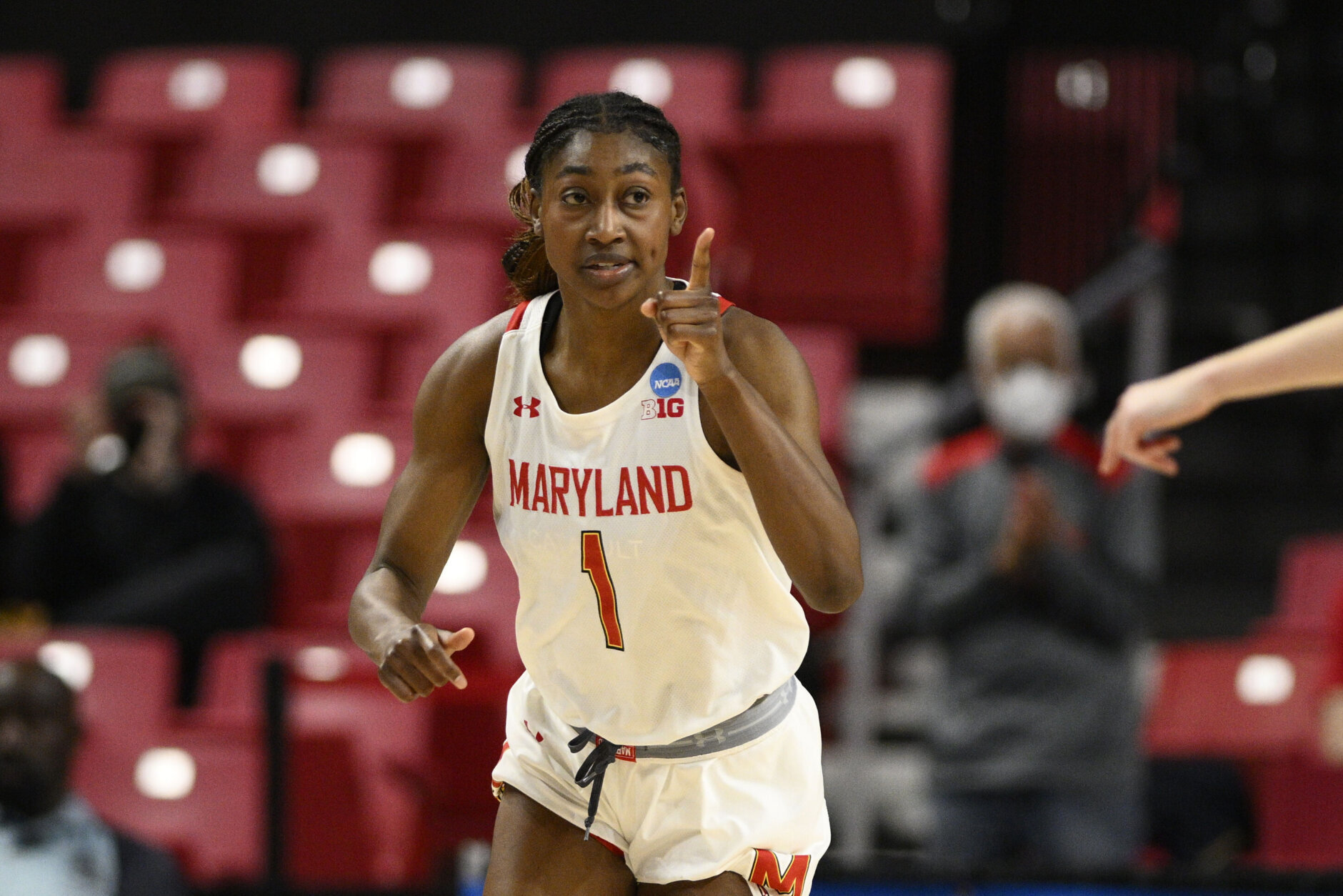 Maryland guard Diamond Miller (1) reacts after she made a basket in the first half of a first-round college basketball game in the NCAA Tournament against Holy Cross, Friday, March 17, 2023, in College Park, Md. (AP Photo/Nick Wass)