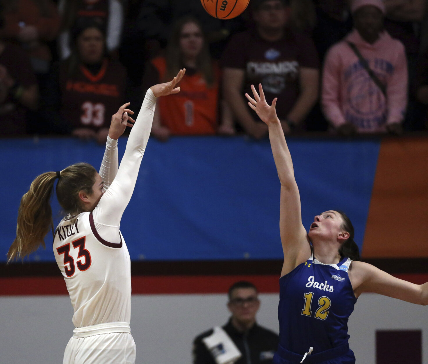 CORRECTS TO SECOND-ROUND NOT FIRST-ROUND - Virginia Tech's Elizabeth Kitley (33) shoots over South Dakota State's Kallie Theisen (12) in the first quarter of a second-round college basketball game in the women's NCAA Tournament, Sunday, March 19, 2023, in Blacksburg, Va. (AP Photo/Matt Gentry)