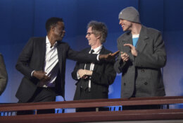From left, comedians Chris Rock, Dana Carvey and Pete Davidson chat at the start of the 24th Annual Mark Twain Prize for American Humor at the Kennedy Center for the Performing Arts on Sunday, March 19, 2023, in Washington. (AP Photo/Kevin Wolf)