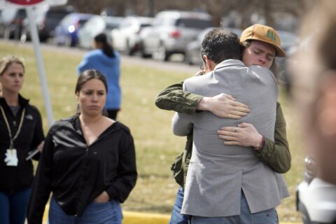 Denver school shooting suspect dead; parents push security