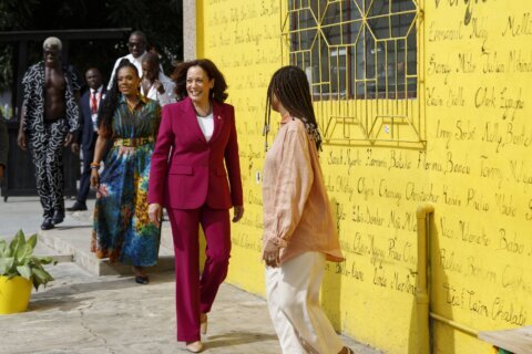 Harris, in Africa, confronts painful past, envisions future