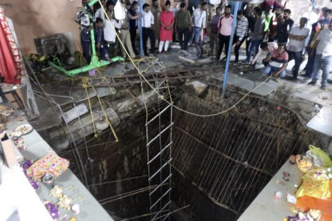 35 bodies found inside well after collapse at Indian temple