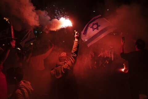 AP PHOTOS: Huge protests erupt in Israel over court reforms