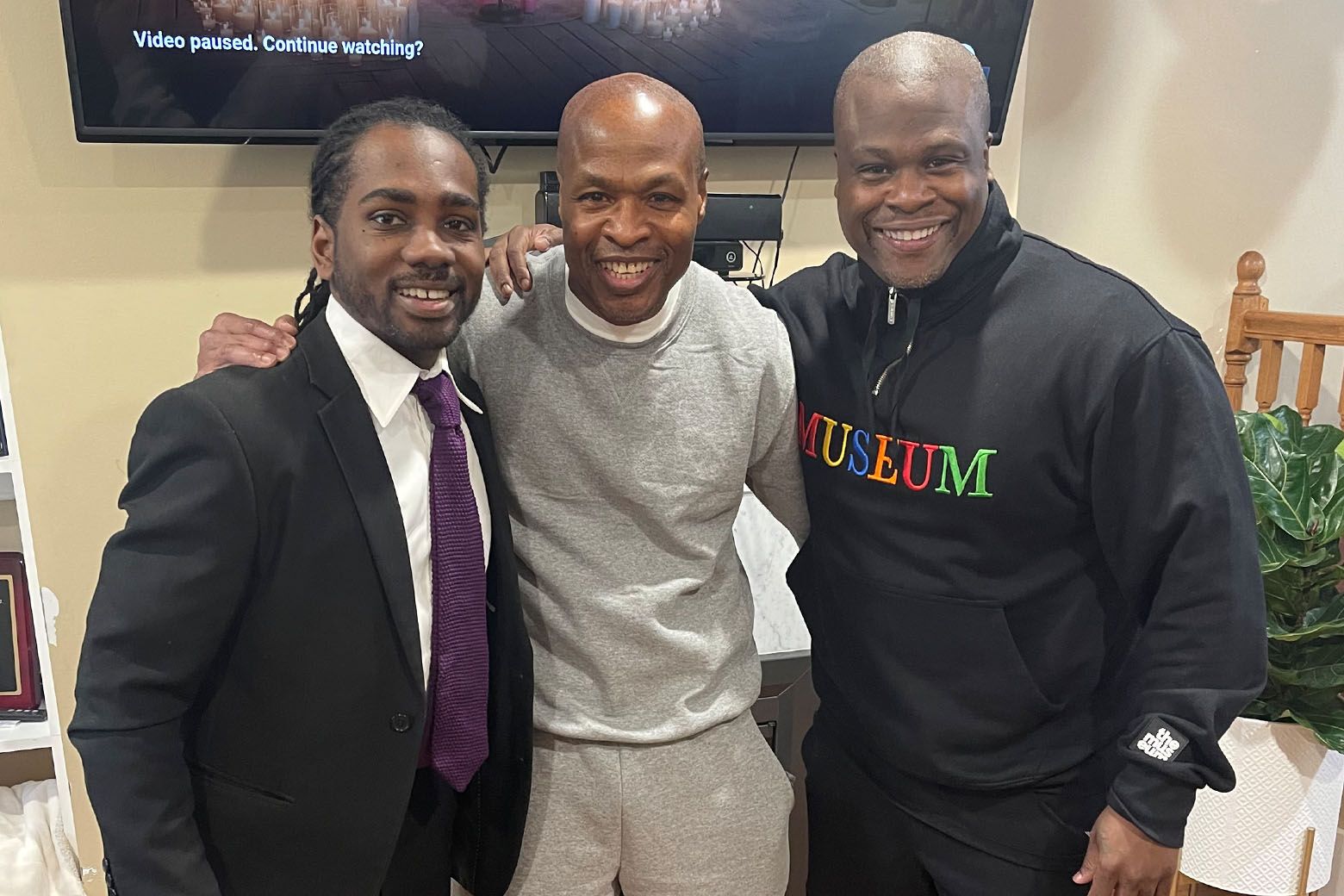 Tony Lewis Sr., pictured center, stands next to his son Tony Lewis Jr., right, and D.C. Ward 8 Council member Trayon White, Sr., left.