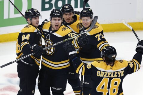 NHL-best Bruins clinch Atlantic with 2-1 win over Tampa Bay