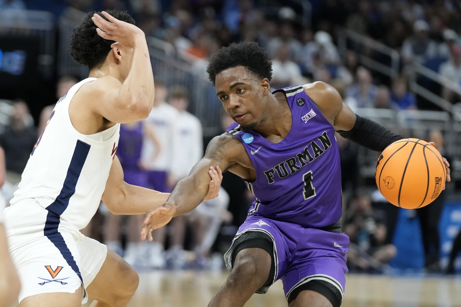 No. 13 seed Furman hands UVA its latest early March exit - WTOP News