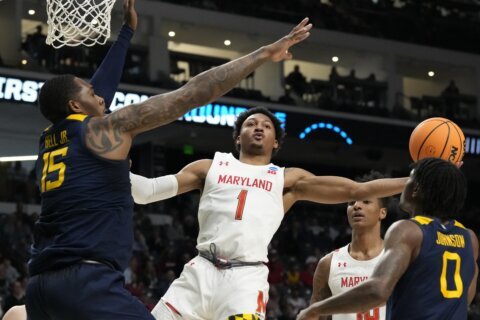 Maryland survives at March Madness, beats WVirginia 67-65