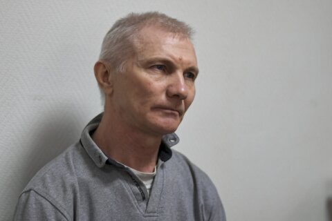 Russia convicts father of teen who drew antiwar picture