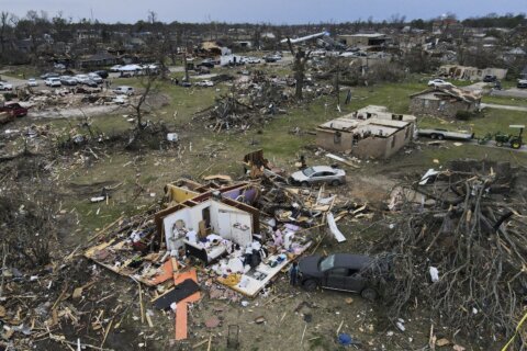 Tornadoes spawned by huge system pulverize homes; 3 dead