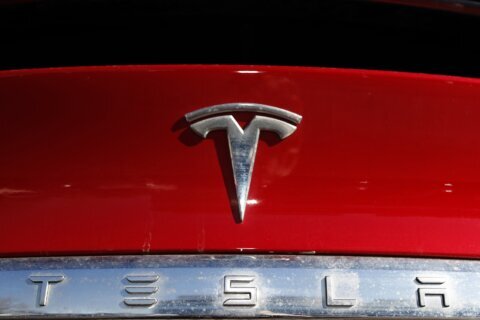 US opens investigation into Tesla seat belts coming loose
