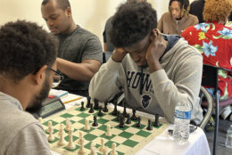 Goodness Atanda, a member of Howard University Award winning Team A, in the middle of a match (WTOP/Melissa Howell)