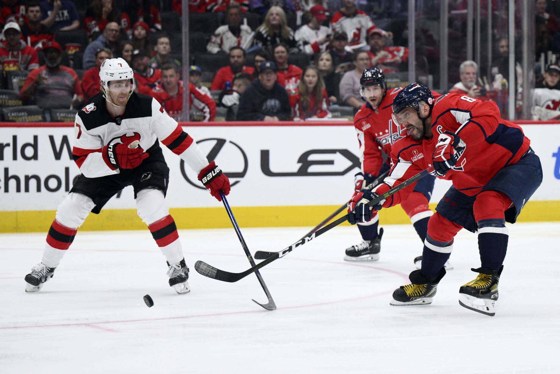 Jack Hughes, Devils get OT win after coach is COVID positive