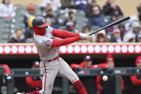 Meneses, Abrams lead Nats over Twins 10-4 in 35-degree chill