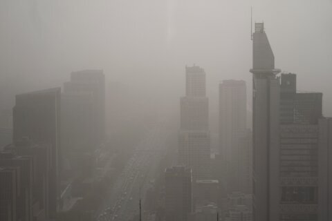 Northern China blanketed with floating sand and dust