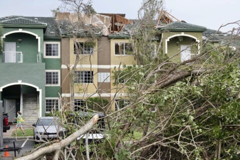 Tornado flips cars, damages homes in coastal Florida city