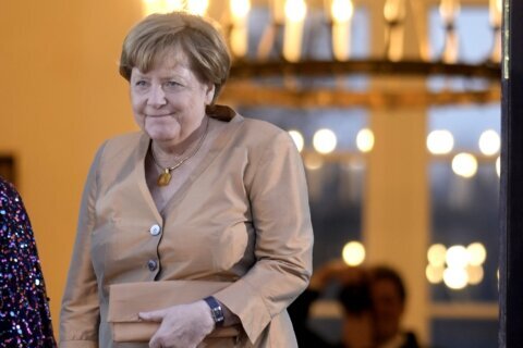 Ex-leader Merkel decorated with highest German honor