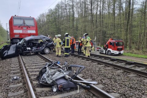 Train hits car at crossing in Germany, 3 killed