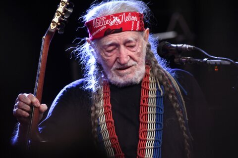 Willie Nelson inhales the love at 90th birthday concert