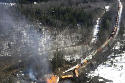 Cleanup begins after freight train derailment, fire in Maine